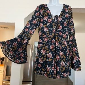 Perennial Favorite Navy Blue Floral Print Long Sleeve Romper